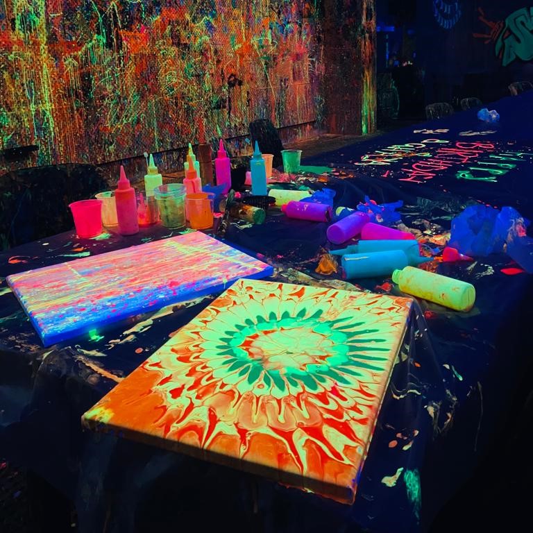 Splatter room Abu Dhabi glow in the dark experiences painting