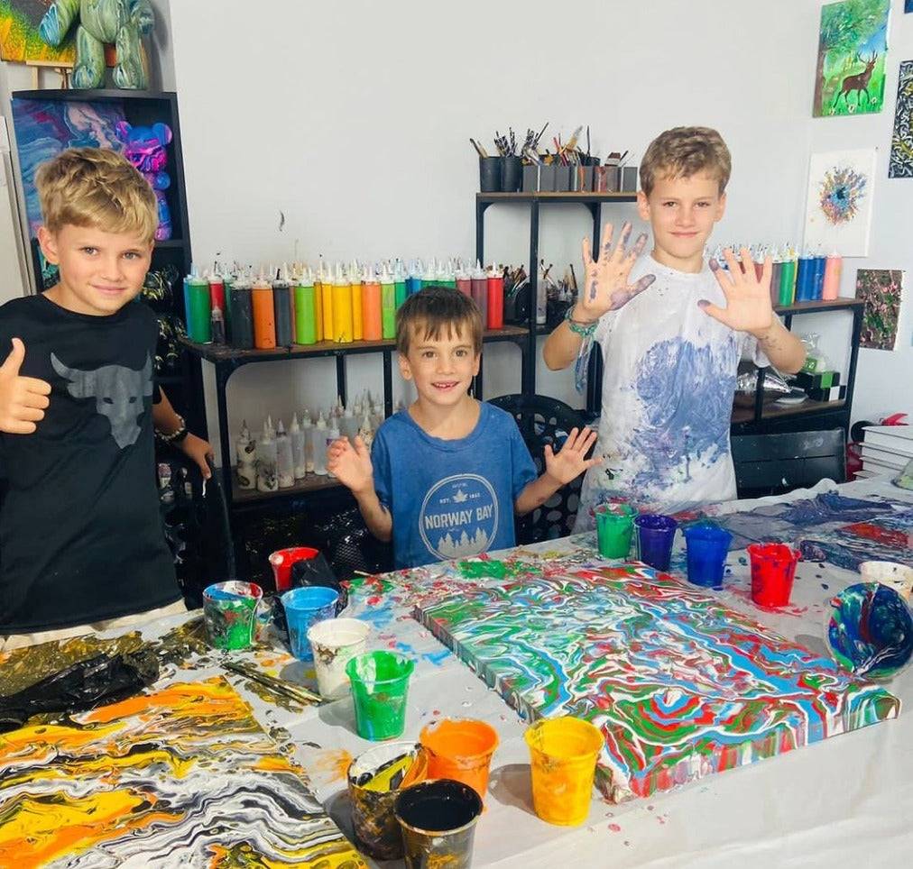 kids enjoying painting class at splatter rooms