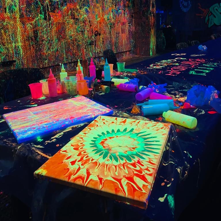 Splatter room Abu Dhabi glow in the dark experiences painting 